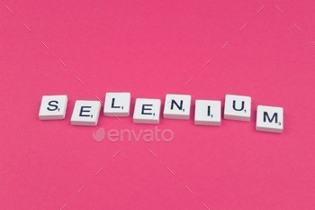 Selenium scrabble letters word on a pink background