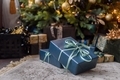 Wrapped gift boxes under Christmas tree - PhotoDune Item for Sale