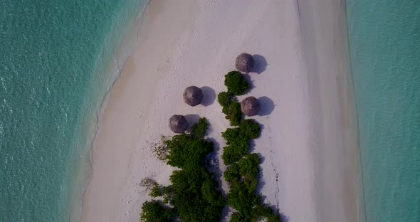 Luxury drone abstract shot of a summer white paradise sand beach and blue ocean background in vibran