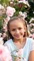 little girl in the rose garden - PhotoDune Item for Sale
