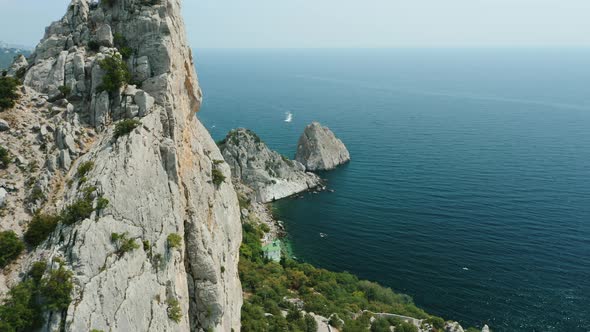 Aerial Fly Above Mountain Koshka of Simeiz with Diva Rock in Background