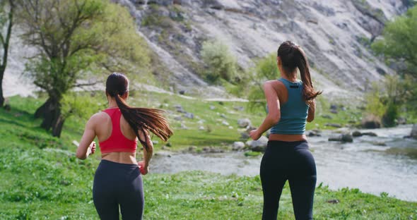 Running Ladies in the Middle of Amazing Landscape