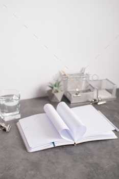 Notebook pages folded in the shape of a heart