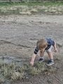 Small Boy Playing in a Puddle - PhotoDune Item for Sale