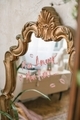 A declaration of love is written in red lipstick on a mirror in a beautiful classic frame. - PhotoDune Item for Sale