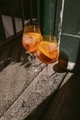 Refreshing aperol cocktails in the contrasting sunlight on the terrace. - PhotoDune Item for Sale