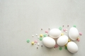 White eggs with the colorful spring sprinkles on the white background  - PhotoDune Item for Sale