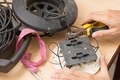 Man repairing and old extension cord reel - PhotoDune Item for Sale