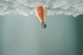 hot air balloon stuck on the ceiling of clouds - PhotoDune Item for Sale