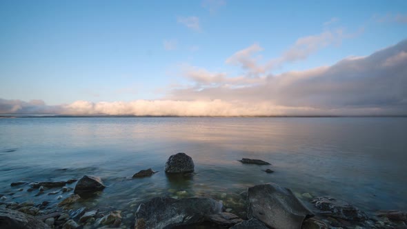 Time lapse shot of Paravani Lake at sunrise. Georgia