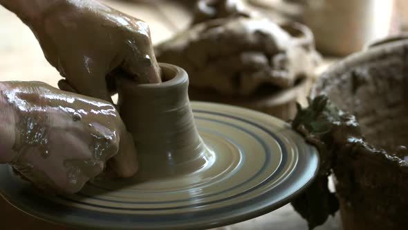 Craftsman Hands Making Pottery Bowl