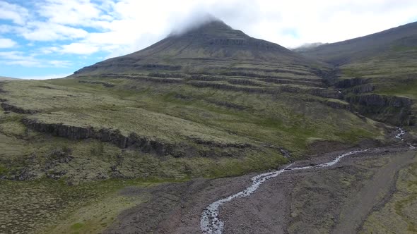 Beautiful landscape in Iceland - a mountain with its top in the cloud