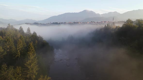 Flying above the river and fog