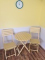 Table, chairs and a clock - PhotoDune Item for Sale