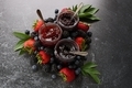 Berry jams with fresh berries and foliage.  - PhotoDune Item for Sale