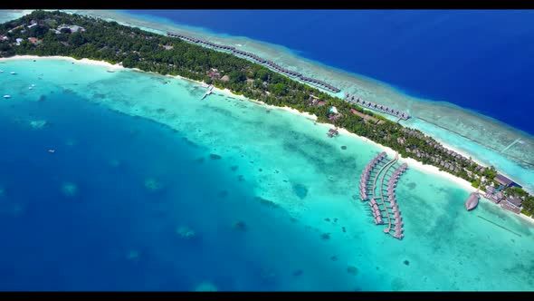 Aerial above panorama of beautiful shore beach vacation by aqua blue sea with white sandy background