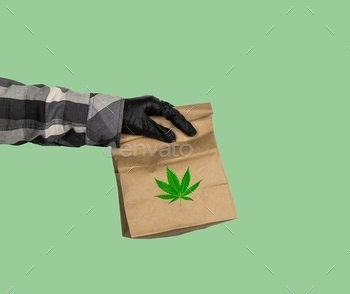 mmercial, concept, container, contraband, courier, crime, dealer, drugs, drugstore, export, ganja, green, hand, hanging, hashish, hemp, herb, illegal, illegally, legalize, man, medicinal, medicine, merchandise, narcotic, paper, plant, purchase, recycled, retail, sell, shipping, smoke, trade, transaction, weed