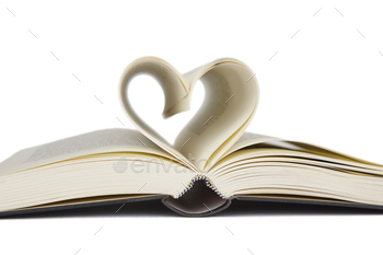 Open book with heart shaped pages. Love for reading