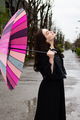 A young beautiful Caucasian girl went for a walk on a rainy day - PhotoDune Item for Sale