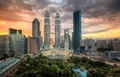 Petronas Twin Towers lit up under a Kuala Lumpur Sunset - PhotoDune Item for Sale