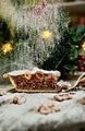 Christmas piece of cake with nuts and powdered sugar the Christmas tree - PhotoDune Item for Sale