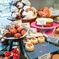 Cakes, pastry and other desserts stand in a local patisserie  - PhotoDune Item for Sale