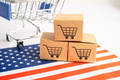 Box with shopping cart logo and USA America flag, Import Export Shopping online - PhotoDune Item for Sale
