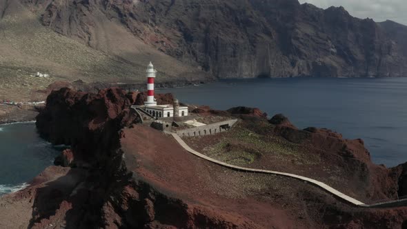 Aerial survey above the roads in Tenerife, Canary islands, lighthouse Teno