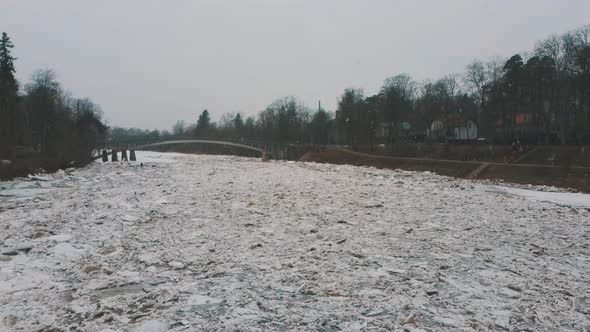 Aerial Dron Shot of the Huge Ice Loads Drift in the River Ogre, Latvia. 4K Video