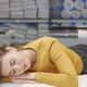 Stunning Woman Smiling to the Camera While Lying on Orthopedic Mattress - VideoHive Item for Sale