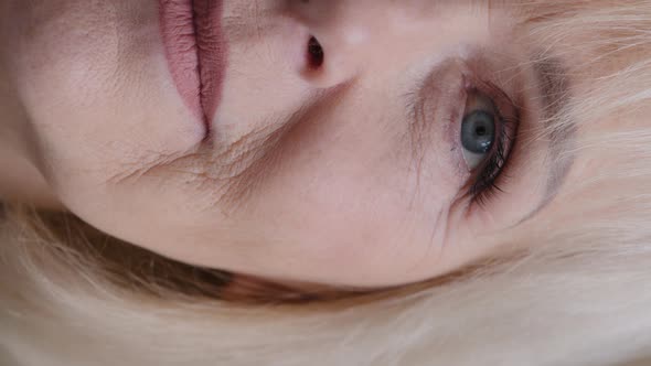 Extreme Close Up Vertical View Macro Detail Half Female Face Old Wrinkled Caucasian Woman Blonde