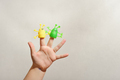 two fingers wearing puppets aliens. Kid playing fingers puppets. Finger theater for children - PhotoDune Item for Sale