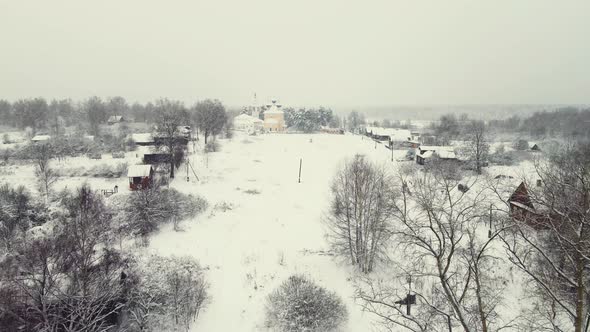 Beautiful Snowy Rural Landscape and Village Winter Aerial View