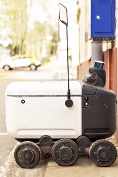 autonomous electric vehicle . Automatic delivery robot for the transportation of goods, and packages