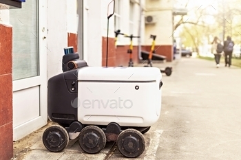 autonomous electric vehicle . Automatic delivery robot for the transportation of goods, and packages