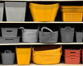 Different colored storage bins on shelves - PhotoDune Item for Sale