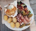 Local Savoyard alpine food. Baked Camembert cheese with charcuterie potatoes salad and pickles - PhotoDune Item for Sale