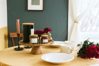en decor, flowers, candles for tea party in country village house, simple life