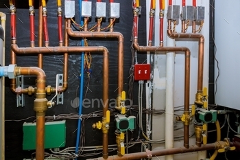 n pipes collector of underfloor heating system pump and pipes