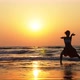 Silhouette of Young Girl Dancing at Sunset in Slow Motion - VideoHive Item for Sale