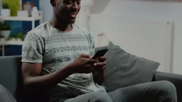 Person Using Smartphone with Touch Screen for Text Messages