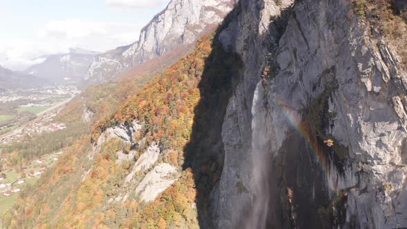 Aerial of beautiful waterfall spawning a rainbow