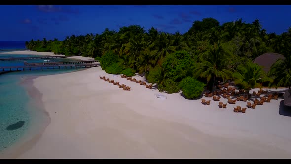 Aerial flying over scenery of marine seashore beach adventure by transparent lagoon with white sand 