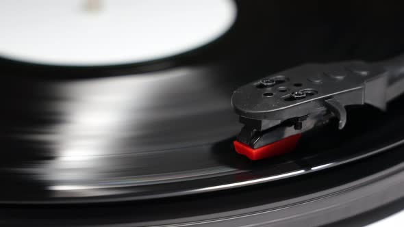 Vinyl turntable with vinyl plate. Gramophone record player. Retro sound technology to play music