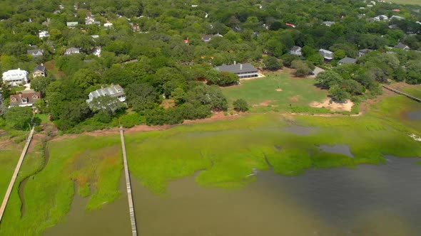 Coastal waterfront park building drone footage.