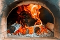 Traditional Italian pizza oven into a wood fire in restaurant - PhotoDune Item for Sale