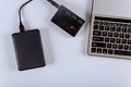 External hard disk and keyboard laptop computer transfer photos - PhotoDune Item for Sale