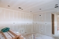 Interior construction of housing project with door and molding installed construction materials - PhotoDune Item for Sale