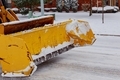 Snow plow doing snow removal after a blizzard in Chicago suberb. - PhotoDune Item for Sale