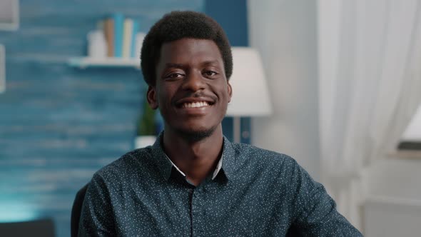 Close Up Portrait of Charming Handsome African American Man Smiling to Camera